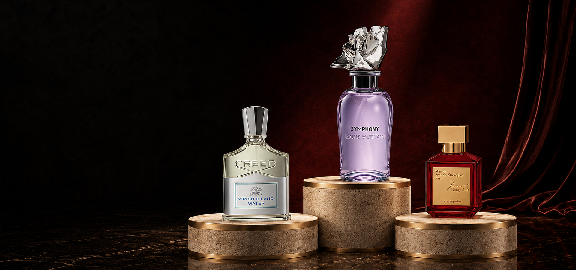 Creed Virgin Island Water, Louis Vuitton Symphony, and MFK Baccarat Rouge 540 on a luxury atelier stage